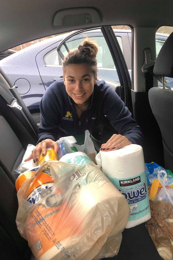 Kenzie Corbin with donation supplies