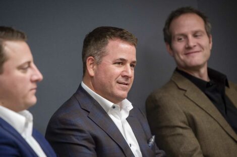 Three presenters speak to students