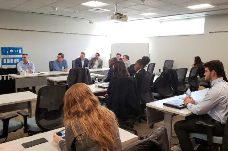 Students listen to panel