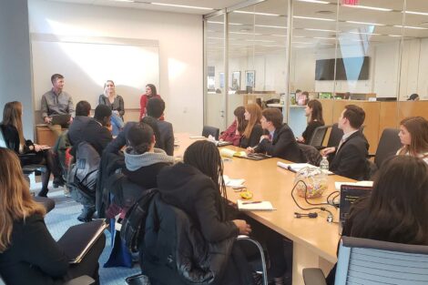 Students learn inside an office