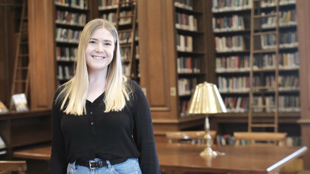 Victoria Zay ’22 stands in the Kirby Library