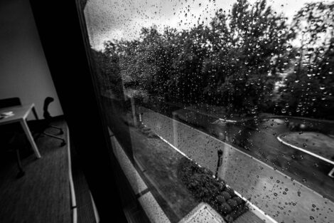 Reflection outside of a window of Oechsle Center for Global Education