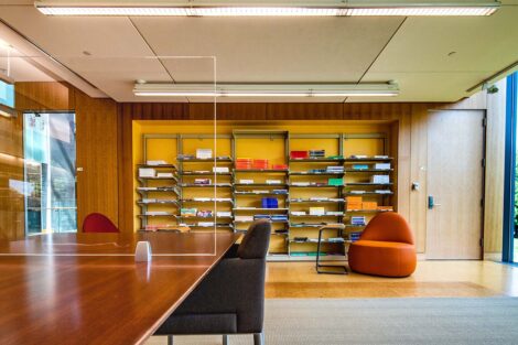 A bookshelf holds magazines in Skillman Library