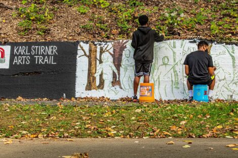 Students working on the wall