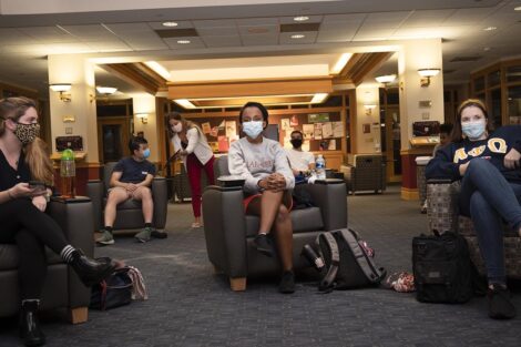 Students watch the first Presidential Debate for the 2020 election at the Farinon College Center.