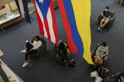Students watch the first Presidential Debate for the 2020 election at the Farinon College Center.
