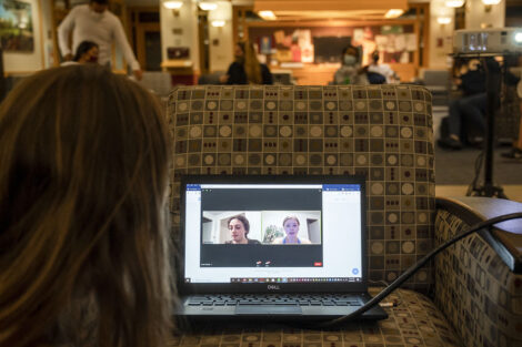 Students watch the first Presidential Debate for the 2020 election at the Farinon College Center.