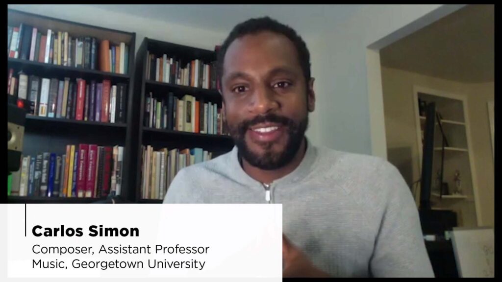 Image of composer Carlos Simon as he discusses his new work