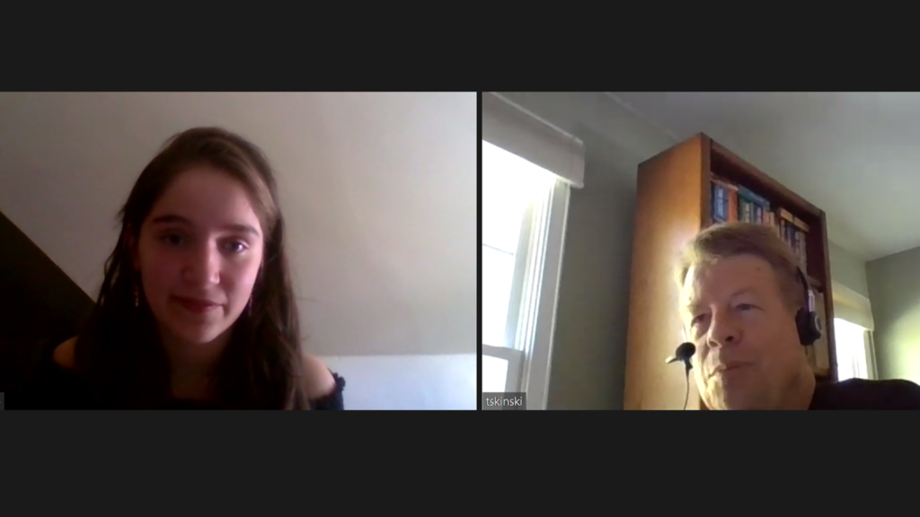 Zoom image of student and alumnus talking