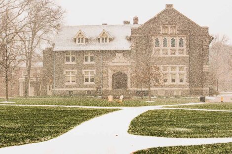 a light snow falls on Hogg Hall