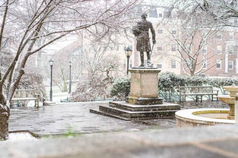statue of Marquis de Lafayette by Colton Chapel with snowfall