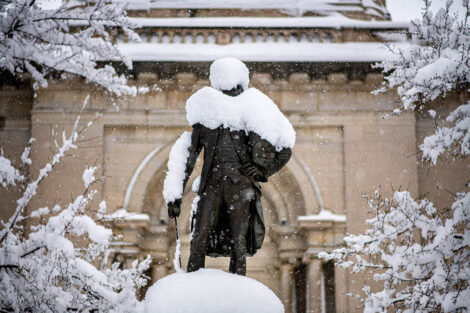 A statue of the Marquis de Lafayette, covered in snow