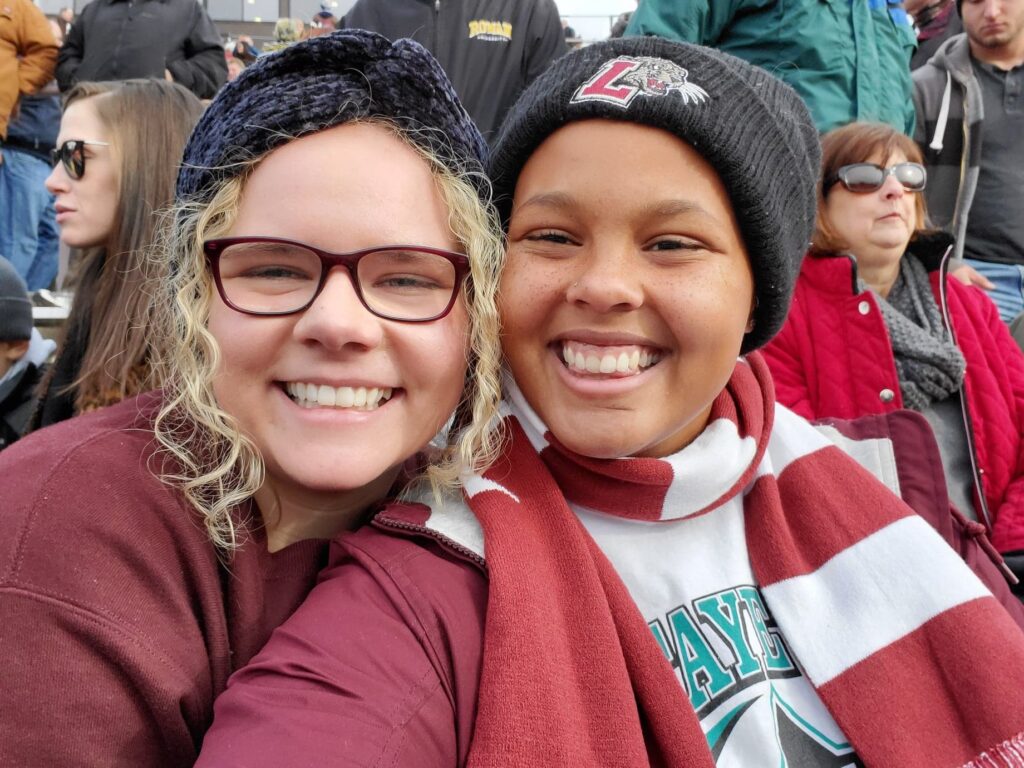 Ellie Aaberg '21 and Olivia Barney '21 at a Lafayette football game