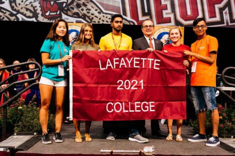 Students hold a Lafayette 2021 College flag.