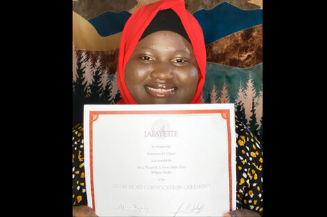 Fatimata Cham holds certificate