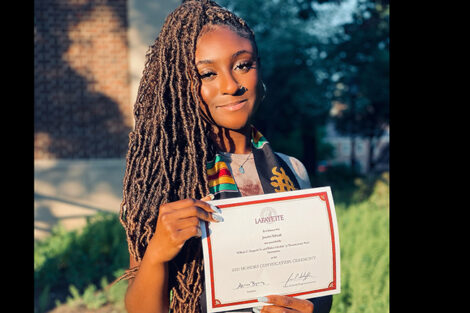 Josette Yeboah holds certificate