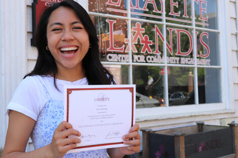 Kimberly Mae Manalang holds certificate