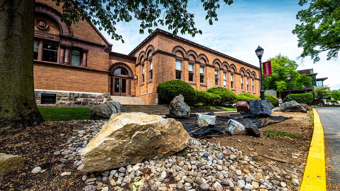 large rocks sit outside Van Wickle Hall