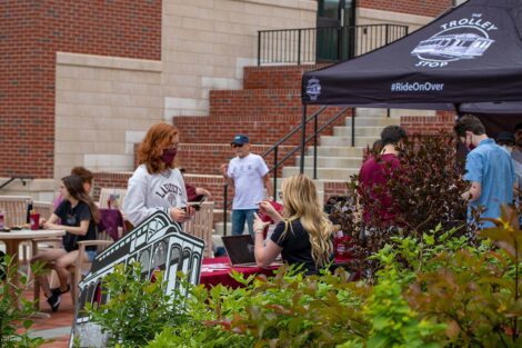 Trolley Stop customers mingle outside