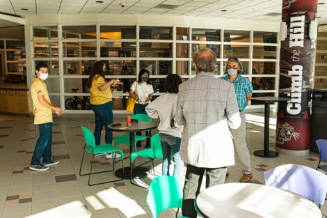 Families gather in the lobby of Kirby Sports Center