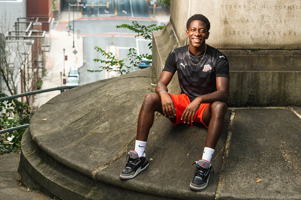 Jimmy Barrios sits in front of the Civil War monument, overlooking downtown Easton.