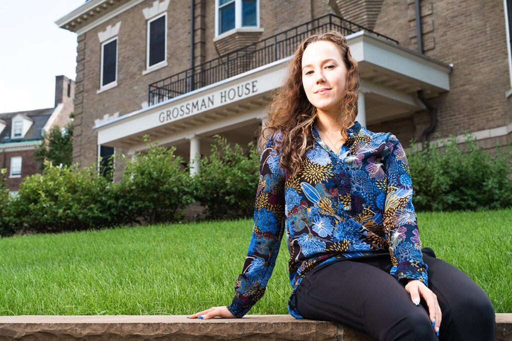 Milena Berestko in front of the Grossman House.