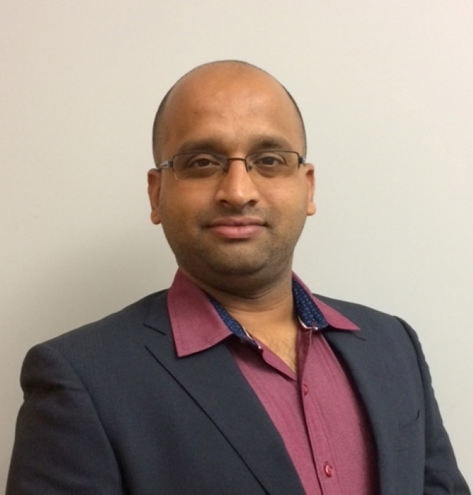 Praveen Malali smiles