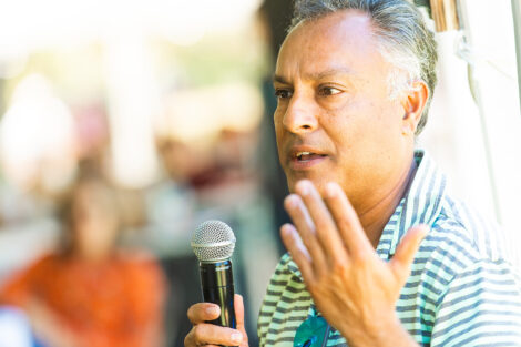 A family member speaks into a microphone.