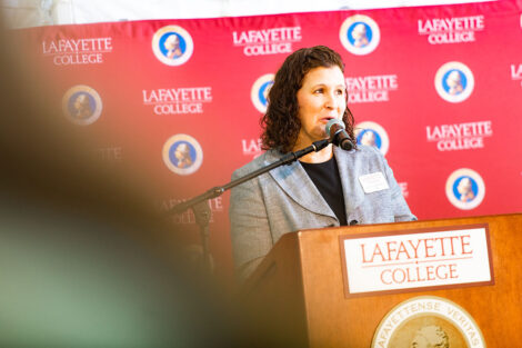 President Nicole Hurd speaks at a podium.