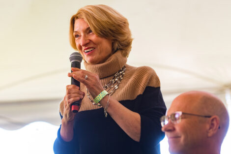 A family member talks into a microphone.