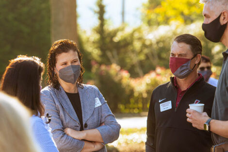 President Hurd mingles with family members outside