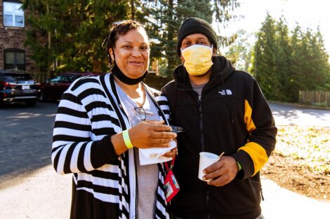 parents smile outside