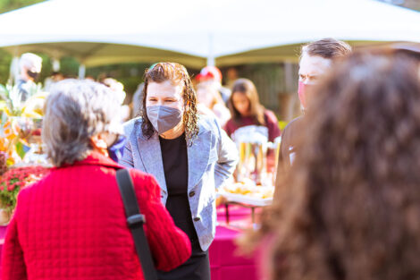 President Hurd mingles with family members outside