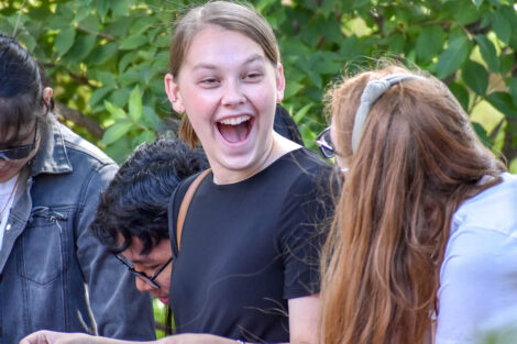 group of students, one has big smile