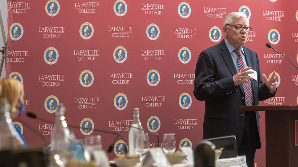 John Kincaid speaks at podium