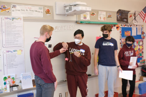 Zoe Boekelheide's FYS class covers gravity & center of mass with Cheston Elementary students as part of Connected Classrooms, Dec. 2021