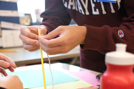 Zoe Boekelheide's FYS class covers gravity & center of mass with Cheston Elementary students as part of Connected Classrooms, Dec. 2021
