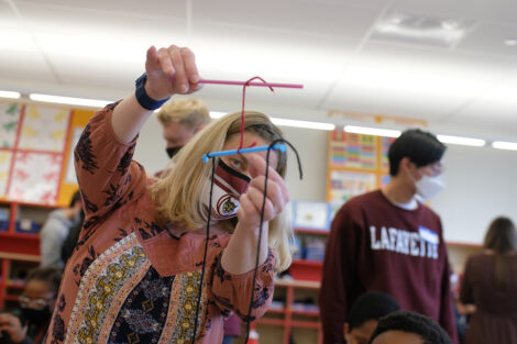 Zoe Boekelheide's FYS class covers gravity & center of mass with Cheston Elementary students as part of Connected Classrooms, Dec. 2021