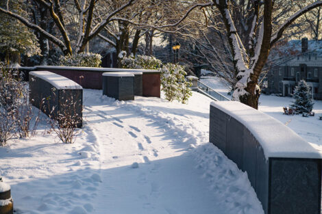 A snowy path with footprints.