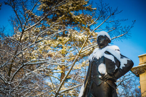 Statue of Marquis de Lafayette, covered in snow.