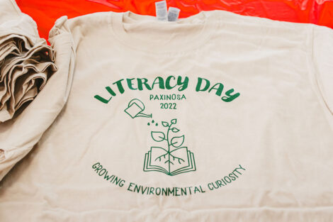 Literacy Day Tshirt says 