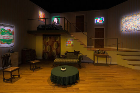 stage is set to show an apartment living room with loft
