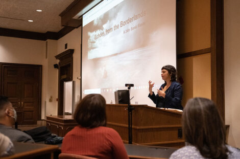 Valeria_Luiselli addresses a room of people from a podium