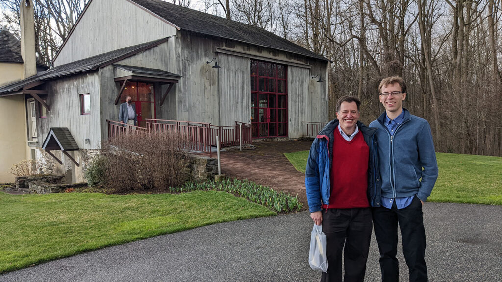 David Bukowski '22 and Prof. Lewis Baratz smile