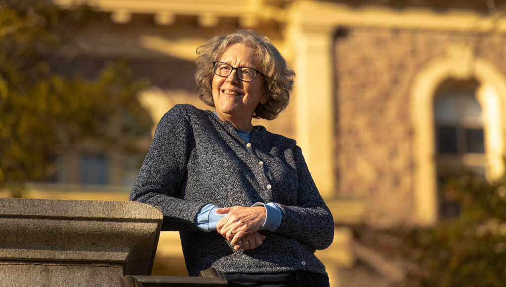 Liz McMahon smiles outside of Pardee Hall.