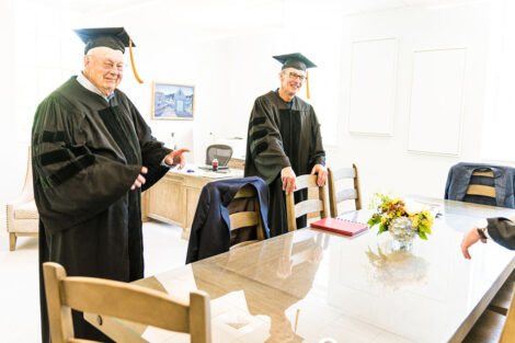 Chip Bergh and Walter Scott in regalia in President's office