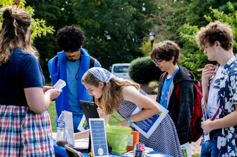 Students speak to each other on the Quad.