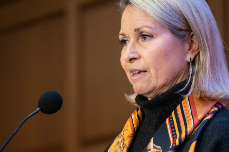 Tracy Sutka speaks to the audience from a podium